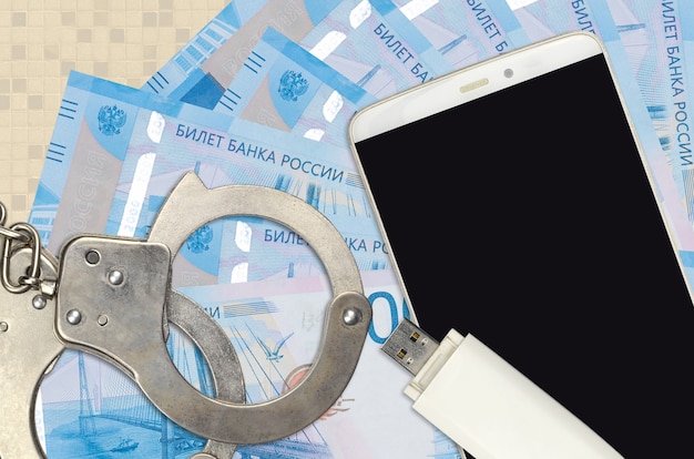 2000 rubli russi fatture e smartphone con le manette della polizia
