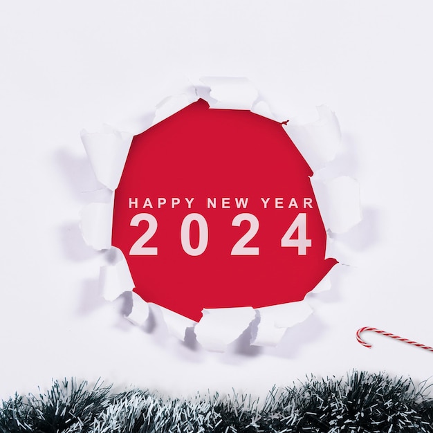 2024 su carta strappata Felice anno nuovo 2024