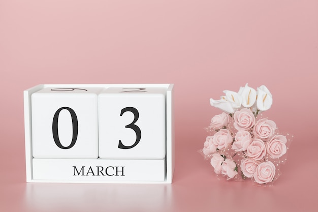 3 marzo. 3 ° giorno del mese Cubo del calendario sul rosa moderno