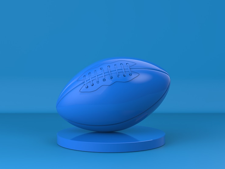 Foto 3d rendering pallone da rugby blu su sfondo blu