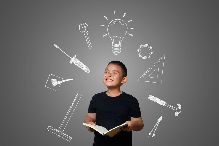 A boy and a book of knowledge on the blackboard background