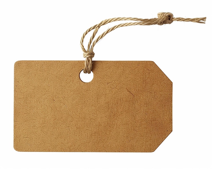 Photo a brown tag with a round hole in the middle