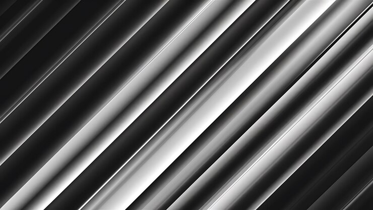 a close up of a metal piece with a black background