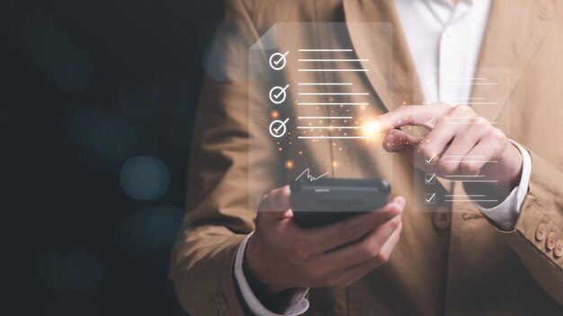 a man reviewing and managing business documents and agreements onlinesigning a business contract approval of contract documents confirmation or warranty certificateemployment idea project review