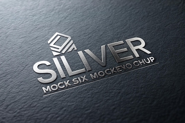 a silver logo for silver cubes is on a black surface