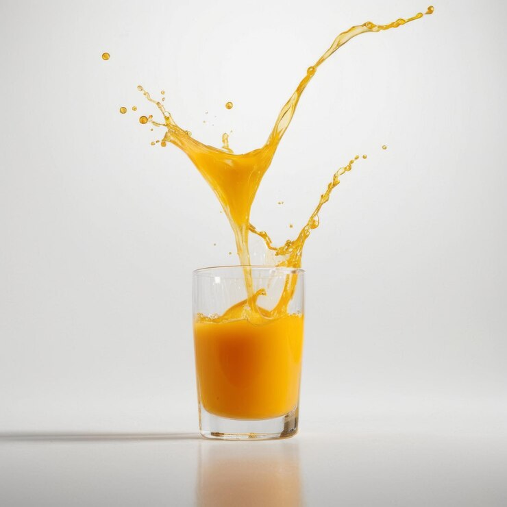 A splash of orange juice on white background