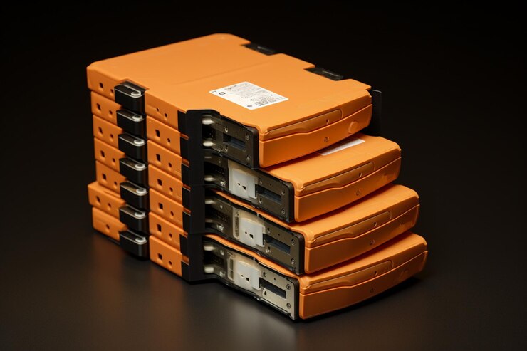Photo a stack of external hard drives and memory cards