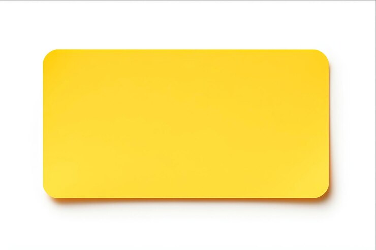 Photo a yellow paper with the word quot t quot on it