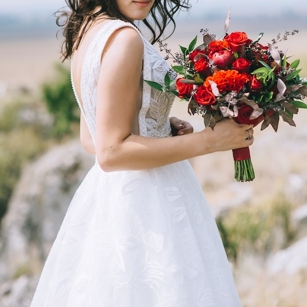 abito da sposa, fedi nuziali, bouquet da sposa