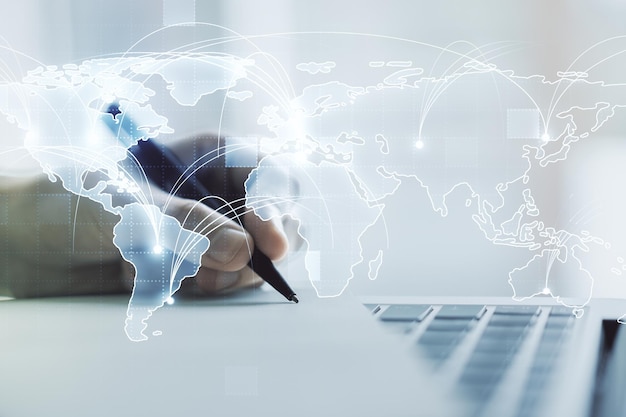 Abstract graphic digital world map with connections and hand writing in diary on background with laptop globalization concept Multiexposure