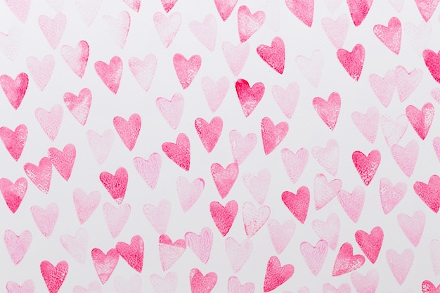 Acquerello astratto rosso, sfondo rosa cuore. Amore di concetto, cartolina d'auguri di San Valentino.