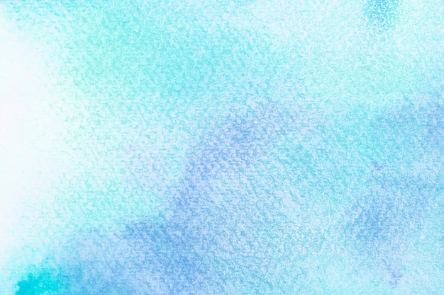 Acquerello blu astratto su fondo bianco Il colore che spruzza nella carta È disegnato a mano.