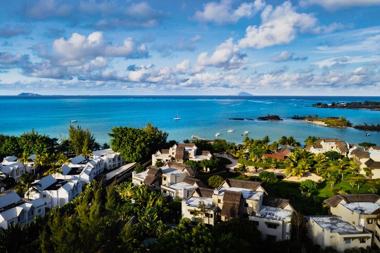 Aerial photography of a coral reef and a hotel complex with beaches in Mauritius, the North-East coast of the island of Mauritius.