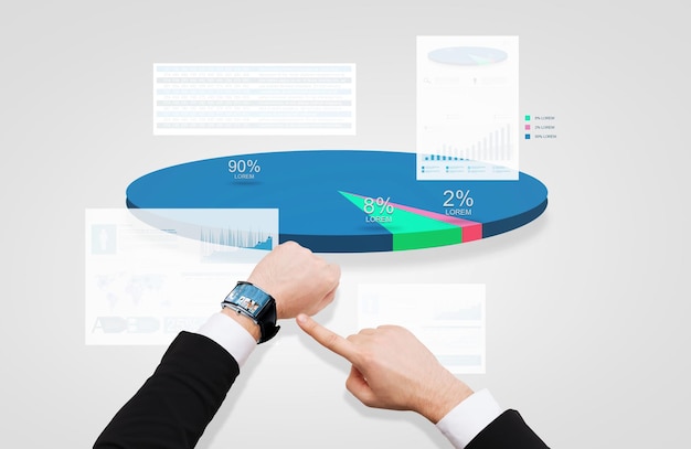 affari, persone, analisi e concetto di tecnologia moderna - primo piano dell'uomo d'affari che punta all'orologio intelligente alla sua mano con notizie sullo schermo sopra grafico e diagramma