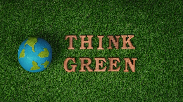 Alfabeto in legno disposto in una campagna di sensibilizzazione ecologica con design di icone ECO su sfondo di erba verde biofilia per promuovere la protezione ambientale per un futuro più verde e sostenibile