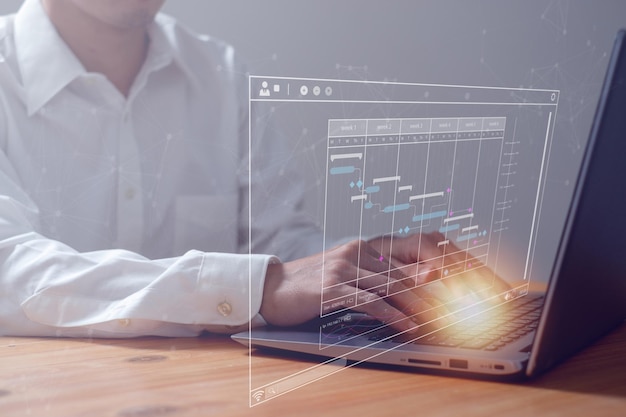 Analista che lavora con il computer in Business Analytics e report Datamake con KPI e metriche collegate al marketing delle vendite di database Strategia aziendale per la finanza