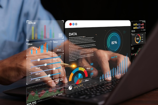Analista di dati che lavora su dashboard di analisi aziendale con grafici con KPI e metriche collegate al database per il marketing delle vendite di operazioni finanziarie tecnologiche