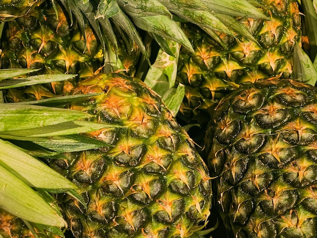 Ananas come cibo biologico sano sfondo frutta fresca alla dieta e all'agricoltura del mercato degli agricoltori