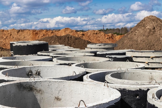 Anelli in cemento armato per l'installazione di pozzi sotterranei in cantiere Prodotti in cemento armato per il dispositivo di comunicazioni sotterranee Fognature e impianti idraulici