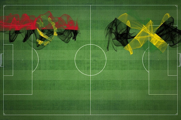 Angola vs Giamaica Partita di calcio colori nazionali bandiere nazionali campo di calcio partita di calcio Concetto di concorrenza Copia spazio