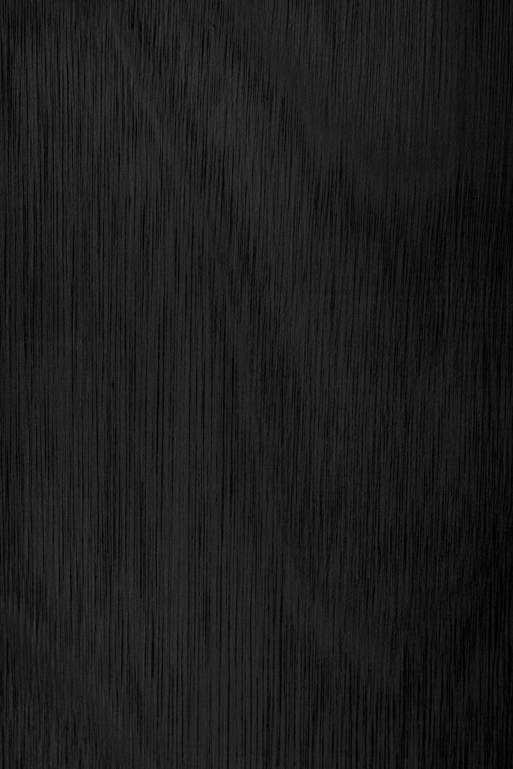Foto angolo ravvicinato di venatura del legno sfondo nero naturale è vuoto per il design e richiede uno sfondo