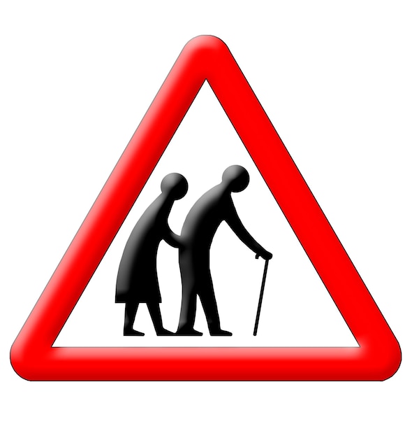 Anziani che attraversano il segnale stradale