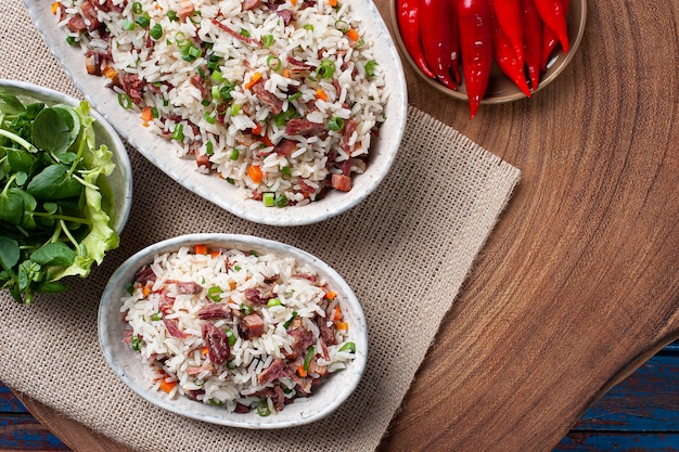 Arroz de Carreteiro con riso, carne secca e salsiccia ai peperoni