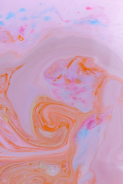 Arte fluida Sfondo multicolore creativo con onde dipinte astratte Vernici miste Bellissimo motivo in marmo