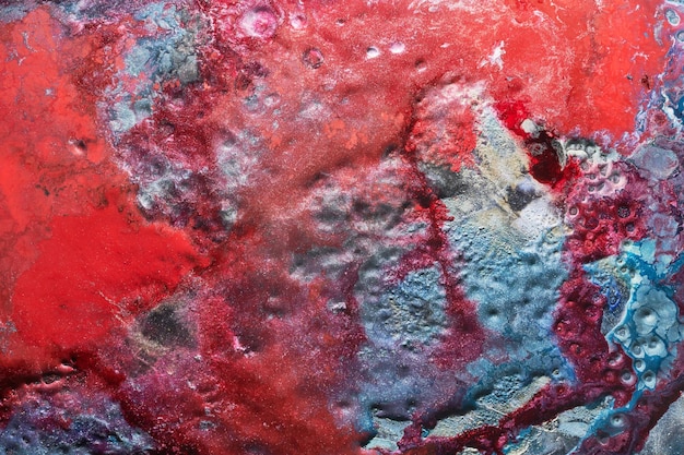 Arte liquida di sfondo astratto di lusso Inchiostro alcolico blu rosso mix con macchie di vernice dorata Struttura in marmo della superficie dell'acqua della terra