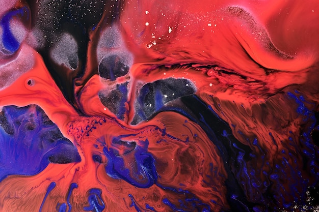 Arte liquida di sfondo astratto di lusso Inchiostro alcolico blu rosso mix con macchie di vernice dorata Struttura in marmo della superficie dell'acqua della terra