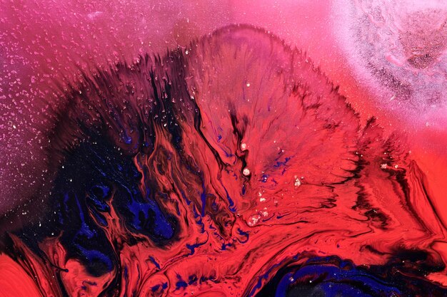 Arte liquida di sfondo astratto di lusso Inchiostro alcolico blu rosso mix con macchie di vernice dorata Struttura in marmo della superficie dell'acqua della terra