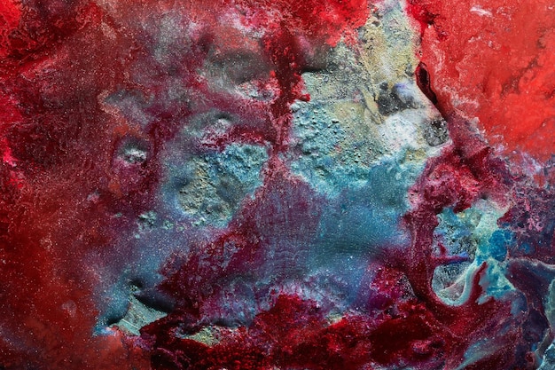 Arte liquida di sfondo astratto di lusso Inchiostro alcolico blu rosso mix con macchie di vernice dorata Struttura in marmo della superficie dell'acqua della terra