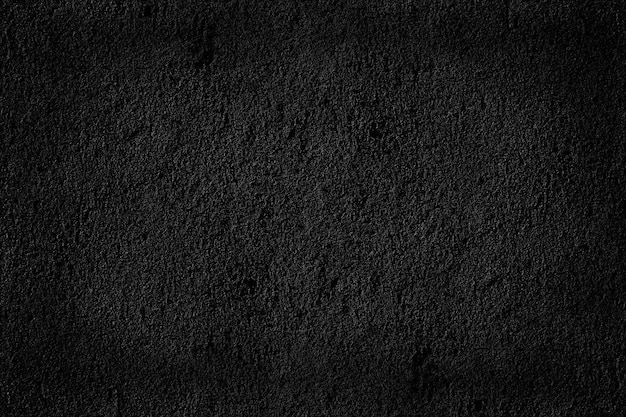 astratto sfondo nero muro di cemento vuoto grunge stucco incrinato texture