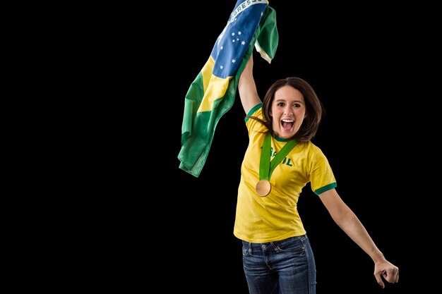 Atleta femminile brasiliano vincendo una medaglia d'oro