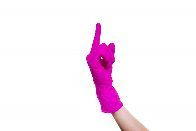 Attenzione una bianca di accentuazione di direzione del dito indice di manifestazione del simbolo di gesto del segno isolata guanto medico rosa