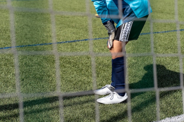 Azione del portiere di calcio nello stadio