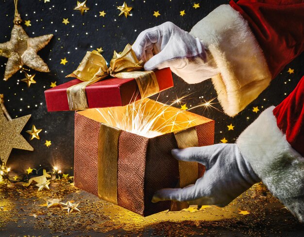 Babbo Natale apre il regalo di Natale con le stelle dorate nella notte spazio di copia e ai generativo