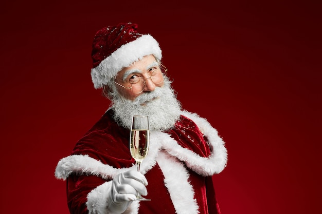 Babbo Natale con bicchiere di champagne