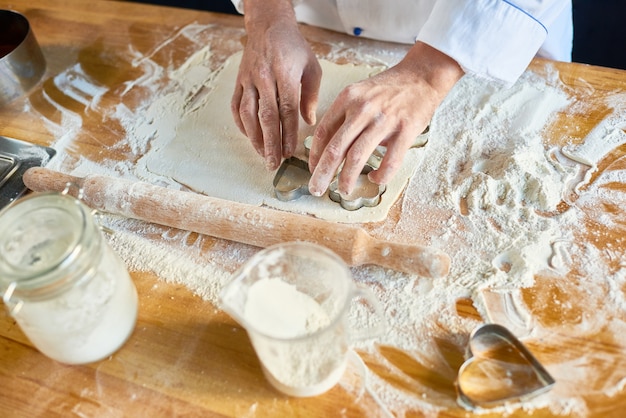 Baker Making Cookies in Cafe