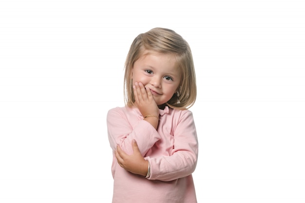 Bambina bionda adorabile su fondo bianco