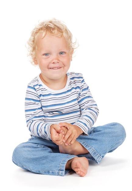 Bambino con capelli ricci bianchi e occhi azzurri