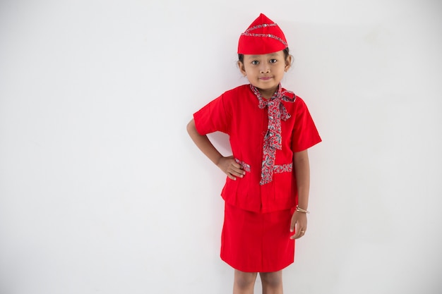 Bambino con uniforme hostess assistente di volo