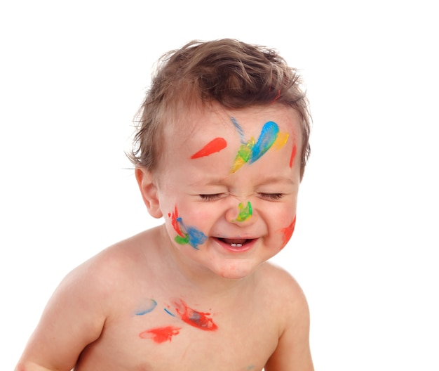 Bambino divertente sporco di vernice
