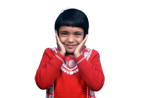 Bambino eccitato felice indiano con il sorriso