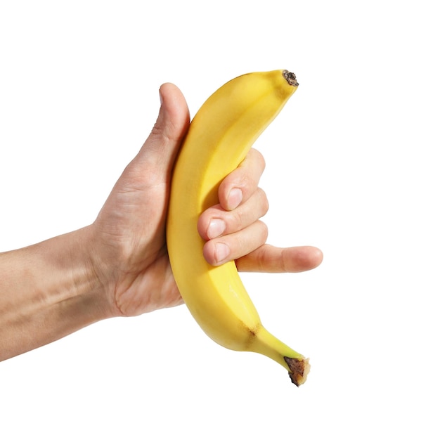 Banana a disposizione sul primo piano bianco