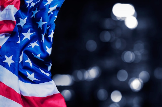 Bandiera americana con sfondo sfocato di luci scintillanti