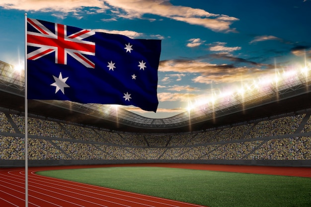 Bandiera australiana davanti a uno stadio di atletica leggera con i fan.