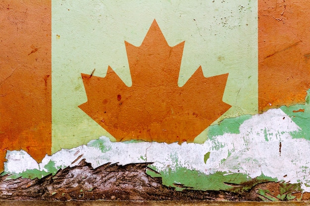 Bandiera canadese dipinta su un muro di cemento
