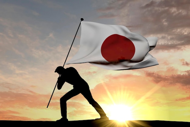 Bandiera del Giappone spinta nel terreno da un rendering 3D di silhouette maschile