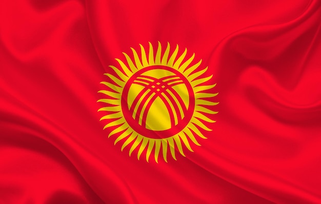Bandiera del paese del Kirghizistan su uno sfondo di tessuto di seta ondulato panorama - illustrazione